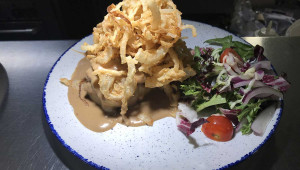 Burger with onion rings O’Connors Bar Ballycastle | Traditional Irish Bar & Restaurant on the Antrim Coast